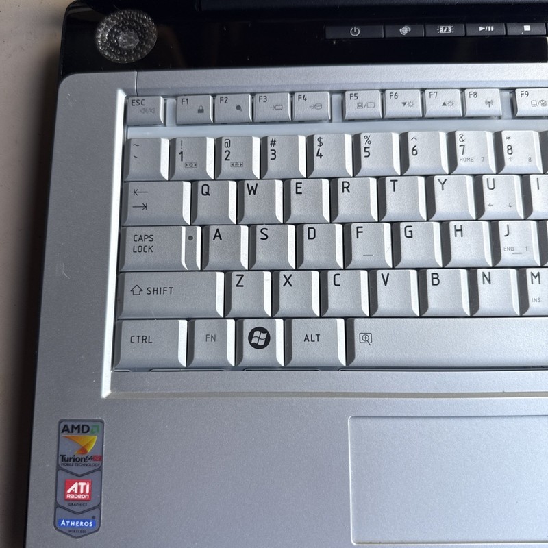 Toshiba Satellite A215-S4747 AMD Turion 64 X2 No Batt Windows Vista w/ Key As Is gallery
