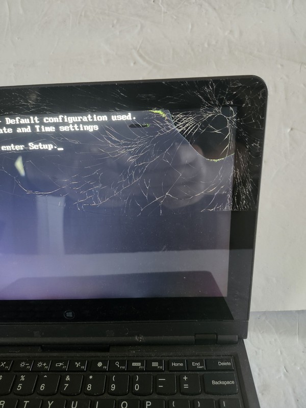 Lenovo ThinkPad 11.6" (Cracked) Powers On While Plugged In, For Parts Or Repair gallery