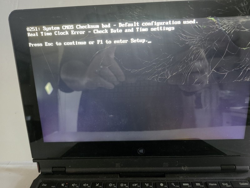 Lenovo ThinkPad 11.6" (Cracked) Powers On While Plugged In, For Parts Or Repair gallery