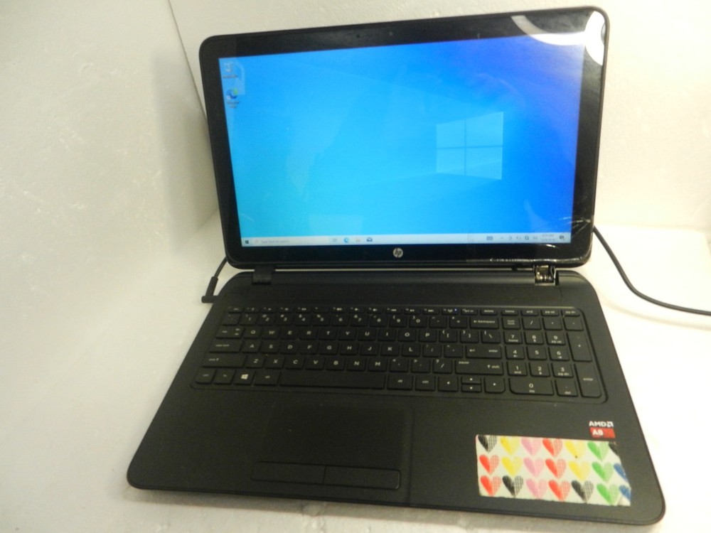 HP 15-f100dx AMD A8-6410 2 GHz 4GB RAM 500 GB HDD CRACKED GLASS but WORKS