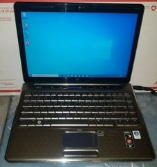 HP Pavilion dv4-1220us 14.1”(AMD Dual-Core @ 2.1GHz,4GB Ram,250GB HDD)Win 10