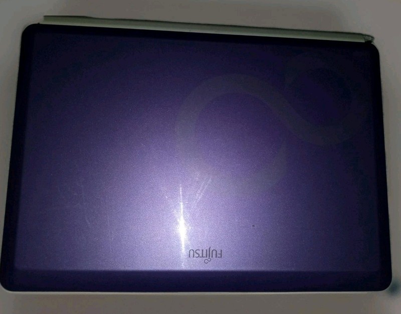 Fujitsu M2010 Series Purple Windows 7 Starter Netbook Laptop Computer gallery